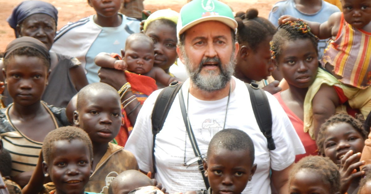 Central African Republic, diocese of Bangassou 25.11.2013Bishop Juan Jose Aguirre with women and children of his diocese