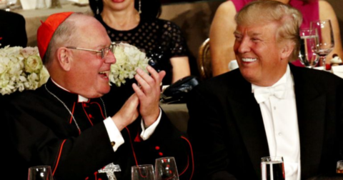 Donald Trump smiles as he sits next to New York Cardinal Timothy Dolan during the Alfred E. Smith Memorial Foundation Dinner in New York City Oct. 20. (CNS/Gregory A. Shemitz)