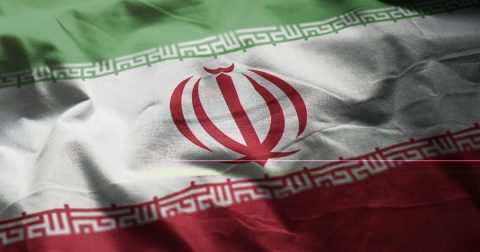 Bahá'ís usados como "bode expiatório" por governo iraniano Bandeira do Irão. Foto natanaelginting